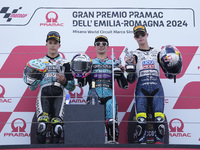 Angel Piqueras of Spain and Leopard Racing (L), David Alonso of Colombia and CFMOTO Aspar Team (C), and Collin Veijer of the Netherlands and...