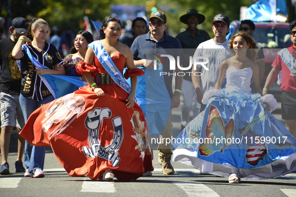 A general view of the 48th Queens Hispanic Parade 2024 marches down 37th Avenue, from 69th Street to 86th Street, through Jackson Heights, Q...