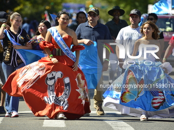 A general view of the 48th Queens Hispanic Parade 2024 marches down 37th Avenue, from 69th Street to 86th Street, through Jackson Heights, Q...