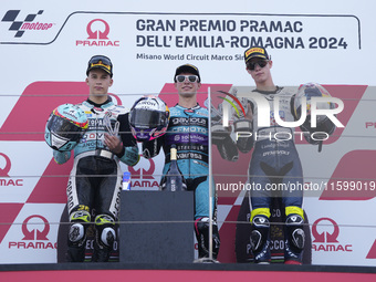 Angel Piqueras of Spain and Leopard Racing (L), David Alonso of Colombia and CFMOTO Aspar Team (C), and Collin Veijer of the Netherlands and...