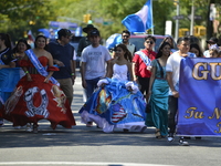 A general view of the 48th Queens Hispanic Parade 2024 marches down 37th Avenue, from 69th Street to 86th Street, through Jackson Heights, Q...