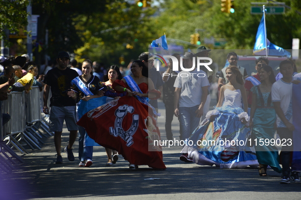 A general view of the 48th Queens Hispanic Parade 2024 marches down 37th Avenue, from 69th Street to 86th Street, through Jackson Heights, Q...