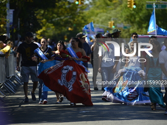 A general view of the 48th Queens Hispanic Parade 2024 marches down 37th Avenue, from 69th Street to 86th Street, through Jackson Heights, Q...