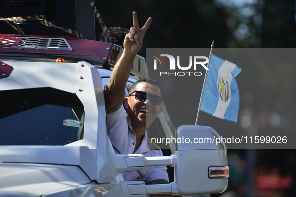 A general view of the 48th Queens Hispanic Parade 2024 marches down 37th Avenue, from 69th Street to 86th Street, through Jackson Heights, Q...