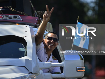 A general view of the 48th Queens Hispanic Parade 2024 marches down 37th Avenue, from 69th Street to 86th Street, through Jackson Heights, Q...