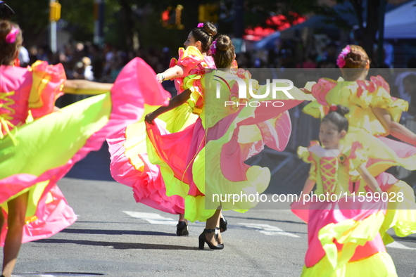 A general view of the 48th Queens Hispanic Parade 2024 marches down 37th Avenue, from 69th Street to 86th Street, through Jackson Heights, Q...