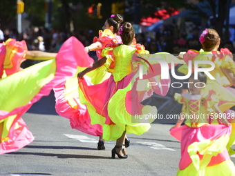 A general view of the 48th Queens Hispanic Parade 2024 marches down 37th Avenue, from 69th Street to 86th Street, through Jackson Heights, Q...