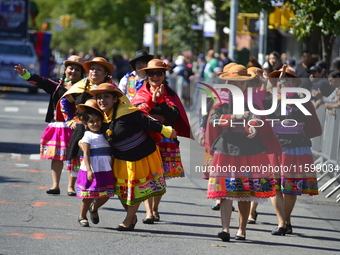 A general view of the 48th Queens Hispanic Parade 2024 marches down 37th Avenue, from 69th Street to 86th Street, through Jackson Heights, Q...