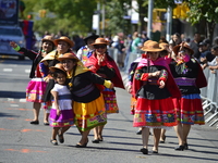 A general view of the 48th Queens Hispanic Parade 2024 marches down 37th Avenue, from 69th Street to 86th Street, through Jackson Heights, Q...