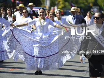 A general view of the 48th Queens Hispanic Parade 2024 marches down 37th Avenue, from 69th Street to 86th Street, through Jackson Heights, Q...