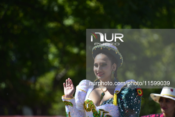 A general view of the 48th Queens Hispanic Parade 2024 marches down 37th Avenue, from 69th Street to 86th Street, through Jackson Heights, Q...