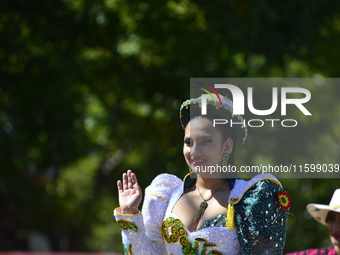 A general view of the 48th Queens Hispanic Parade 2024 marches down 37th Avenue, from 69th Street to 86th Street, through Jackson Heights, Q...