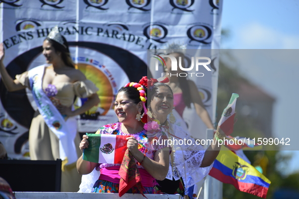 A general view of the 48th Queens Hispanic Parade 2024 marches down 37th Avenue, from 69th Street to 86th Street, through Jackson Heights, Q...