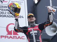 Aron Canet of Spain and Fantic Racing celebrate the second place scored during the Moto2 race of the MotoGP of Emilia Romagna at Misano Worl...