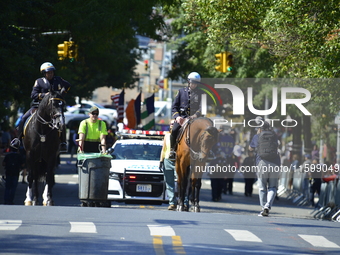 A general view of the 48th Queens Hispanic Parade 2024 marches down 37th Avenue, from 69th Street to 86th Street, through Jackson Heights, Q...