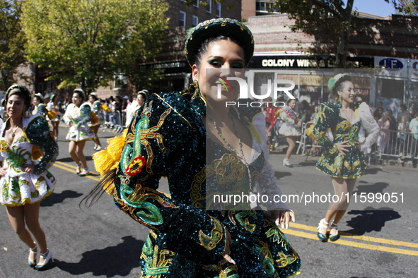 A general view of the 48th Queens Hispanic Parade 2024 marches down 37th Avenue, from 69th Street to 86th Street, through Jackson Heights, Q...