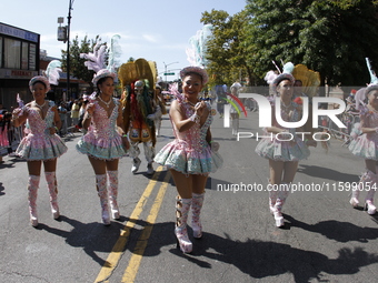 A general view of the 48th Queens Hispanic Parade 2024 marches down 37th Avenue, from 69th Street to 86th Street, through Jackson Heights, Q...