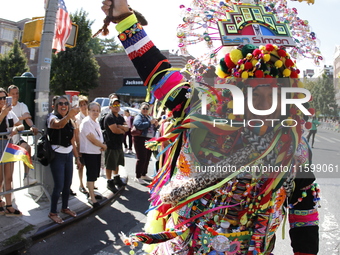 A general view of the 48th Queens Hispanic Parade 2024 marches down 37th Avenue, from 69th Street to 86th Street, through Jackson Heights, Q...