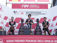 Aron Canet of Spain and Fantic Racing (L), Celestino Vietti of Italy and Red Bull KTM Ajo (C), and Tony Arbolino of Italy and ELF Marc VDS R...