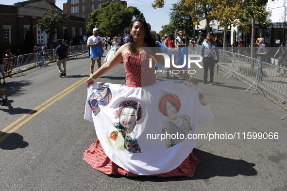 A general view of the 48th Queens Hispanic Parade 2024 marches down 37th Avenue, from 69th Street to 86th Street, through Jackson Heights, Q...