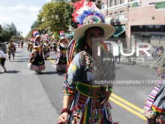 A general view of the 48th Queens Hispanic Parade 2024 marches down 37th Avenue, from 69th Street to 86th Street, through Jackson Heights, Q...