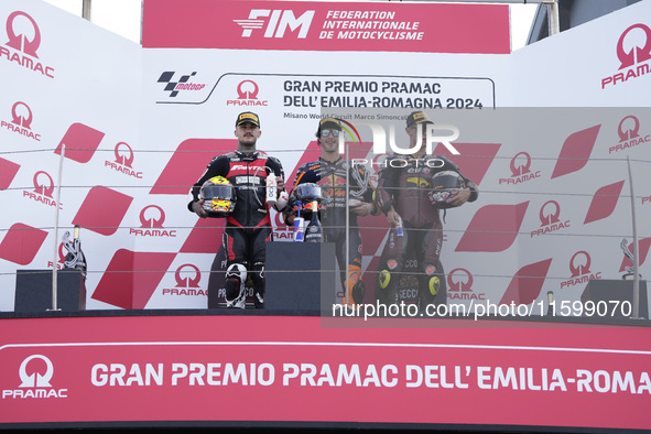 Aron Canet of Spain and Fantic Racing (L), Celestino Vietti of Italy and Red Bull KTM Ajo (C), and Tony Arbolino of Italy and ELF Marc VDS R...