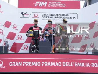 Aron Canet of Spain and Fantic Racing (L), Celestino Vietti of Italy and Red Bull KTM Ajo (C), and Tony Arbolino of Italy and ELF Marc VDS R...