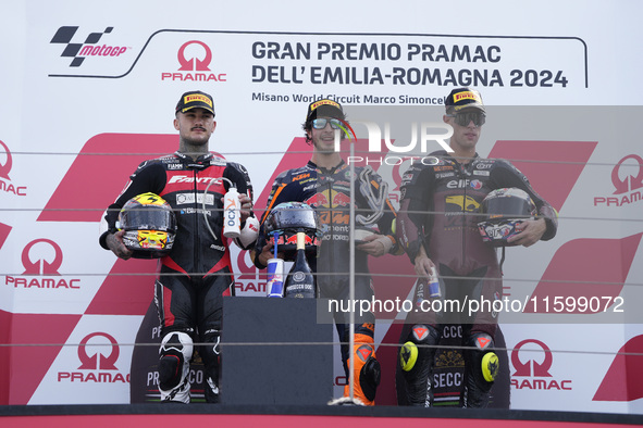 Aron Canet of Spain and Fantic Racing (L), Celestino Vietti of Italy and Red Bull KTM Ajo (C), and Tony Arbolino of Italy and ELF Marc VDS R...