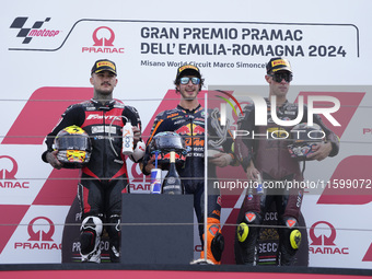 Aron Canet of Spain and Fantic Racing (L), Celestino Vietti of Italy and Red Bull KTM Ajo (C), and Tony Arbolino of Italy and ELF Marc VDS R...