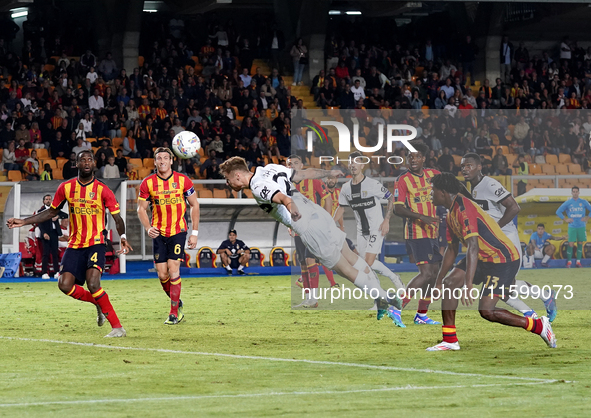 Antoine Hainaut of Parma Calcio scores a goal during the Serie A match between Lecce and Parma in Lecce, Italy, on September 21, 2024. 