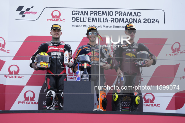 Aron Canet of Spain and Fantic Racing (L), Celestino Vietti of Italy and Red Bull KTM Ajo (C), and Tony Arbolino of Italy and ELF Marc VDS R...