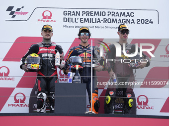 Aron Canet of Spain and Fantic Racing (L), Celestino Vietti of Italy and Red Bull KTM Ajo (C), and Tony Arbolino of Italy and ELF Marc VDS R...