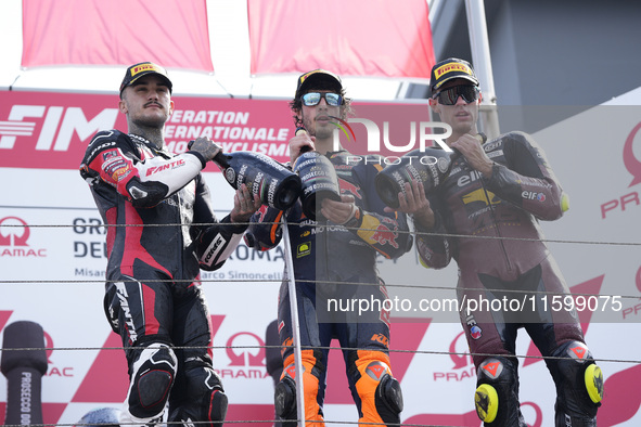 Aron Canet of Spain and Fantic Racing (L), Celestino Vietti of Italy and Red Bull KTM Ajo (C), and Tony Arbolino of Italy and ELF Marc VDS R...