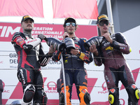 Aron Canet of Spain and Fantic Racing (L), Celestino Vietti of Italy and Red Bull KTM Ajo (C), and Tony Arbolino of Italy and ELF Marc VDS R...