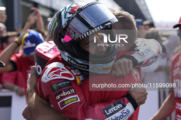 Enea Bastianini of Italy and Ducati Lenovo Team celebrate the victory of the MotoGP of Emilia Romagna at Misano World Circuit in Misano Adri...