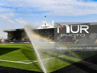 A rainbow forms as the sprinklers spray water on the pitch during the Sky Bet League 2 match between Notts County and Gillingham at Meadow L...