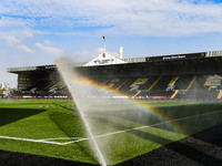 A rainbow forms as the sprinklers spray water on the pitch during the Sky Bet League 2 match between Notts County and Gillingham at Meadow L...