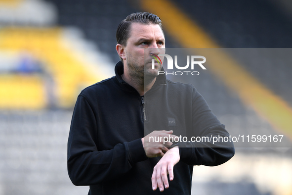 Mark Bonner manages Gillingham during the Sky Bet League 2 match between Notts County and Gillingham at Meadow Lane in Nottingham, England,...