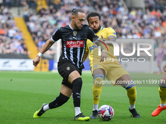 Jodi Jones of Notts County battles with Jayden Clarke of Gillingham during the Sky Bet League 2 match between Notts County and Gillingham at...