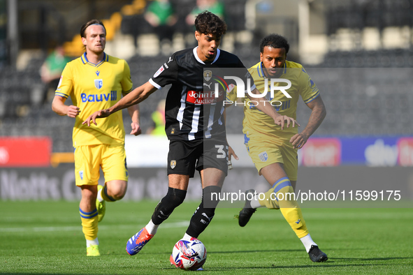 George Abbott of Notts County is in action during the Sky Bet League 2 match between Notts County and Gillingham at Meadow Lane in Nottingha...