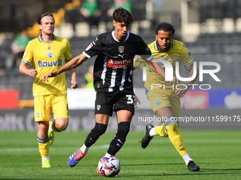 George Abbott of Notts County is in action during the Sky Bet League 2 match between Notts County and Gillingham at Meadow Lane in Nottingha...