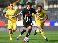 George Abbott of Notts County is in action during the Sky Bet League 2 match between Notts County and Gillingham at Meadow Lane in Nottingha...