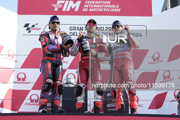 Jorge Martin of Spain and Prima Pramac Racing (L), Enea Bastianini of Italy and Ducati Lenovo Team (C), and Marc Marquez of Spain and Gresin...