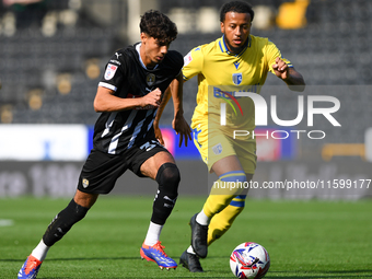 George Abbott of Notts County is in action during the Sky Bet League 2 match between Notts County and Gillingham at Meadow Lane in Nottingha...