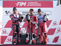 Jorge Martin of Spain and Prima Pramac Racing (L), Enea Bastianini of Italy and Ducati Lenovo Team (C), and Marc Marquez of Spain and Gresin...