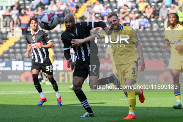 David McGoldrick of Notts County battles with Max Clark of Gillingham during the Sky Bet League 2 match between Notts County and Gillingham...