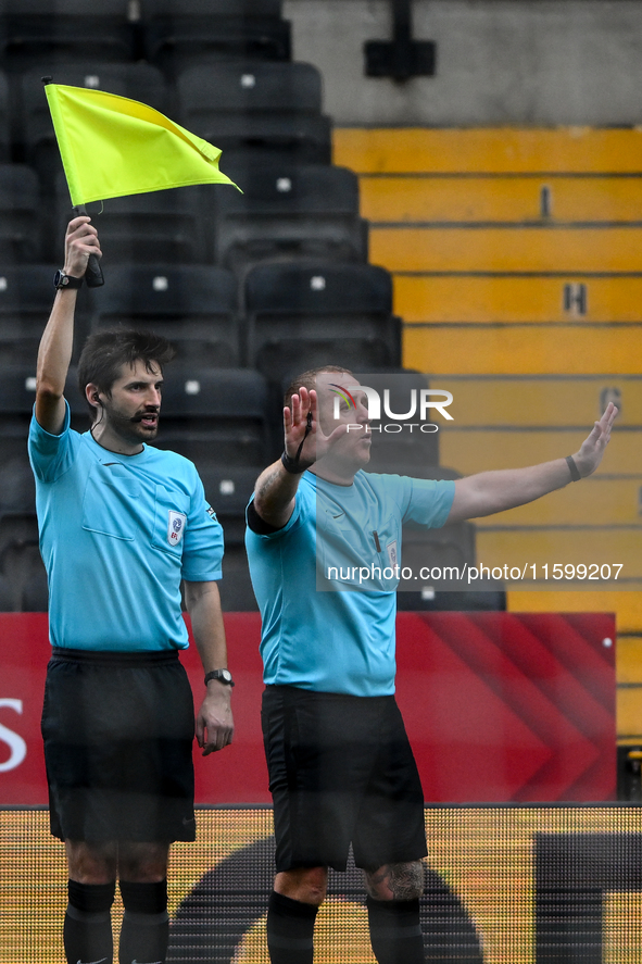 Referee Lee Swabey gestures during the Sky Bet League 2 match between Notts County and Gillingham at Meadow Lane in Nottingham, England, on...