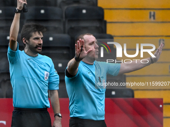 Referee Lee Swabey gestures during the Sky Bet League 2 match between Notts County and Gillingham at Meadow Lane in Nottingham, England, on...