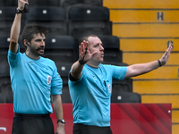 Referee Lee Swabey gestures during the Sky Bet League 2 match between Notts County and Gillingham at Meadow Lane in Nottingham, England, on...