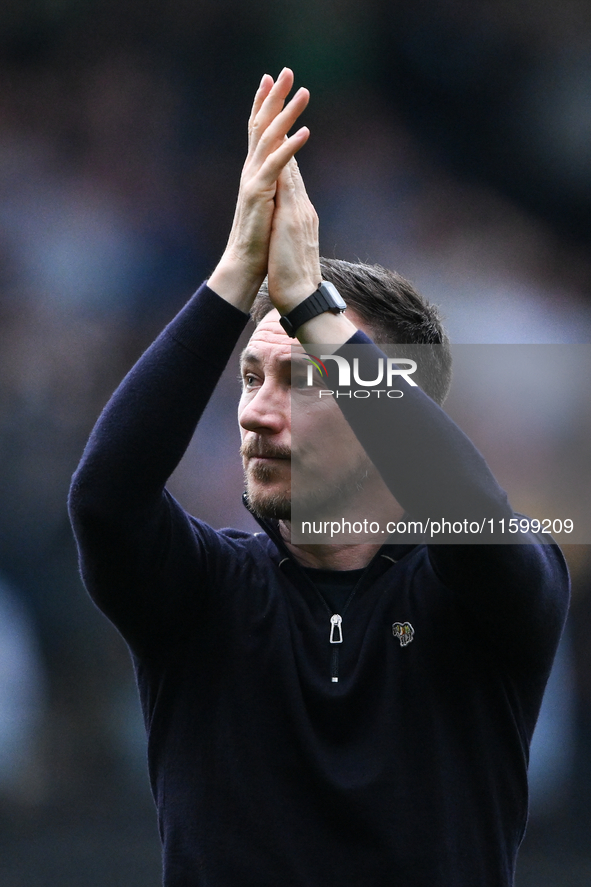 Stuart Maynard, manager of Notts County, applauds his team's supporters during the Sky Bet League 2 match between Notts County and Gillingha...